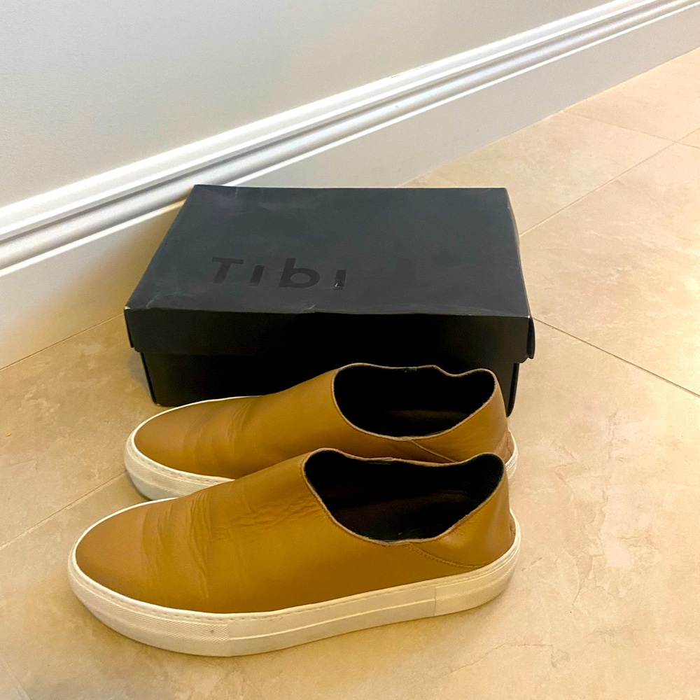 Tan slip ons. You can wear it with the the heel up or down.